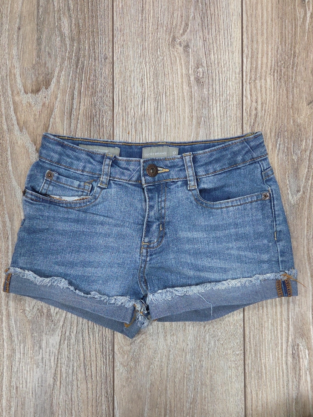Lucky Brand  Size 10 Distressed Blue Denim Rolled-Hem Shorts